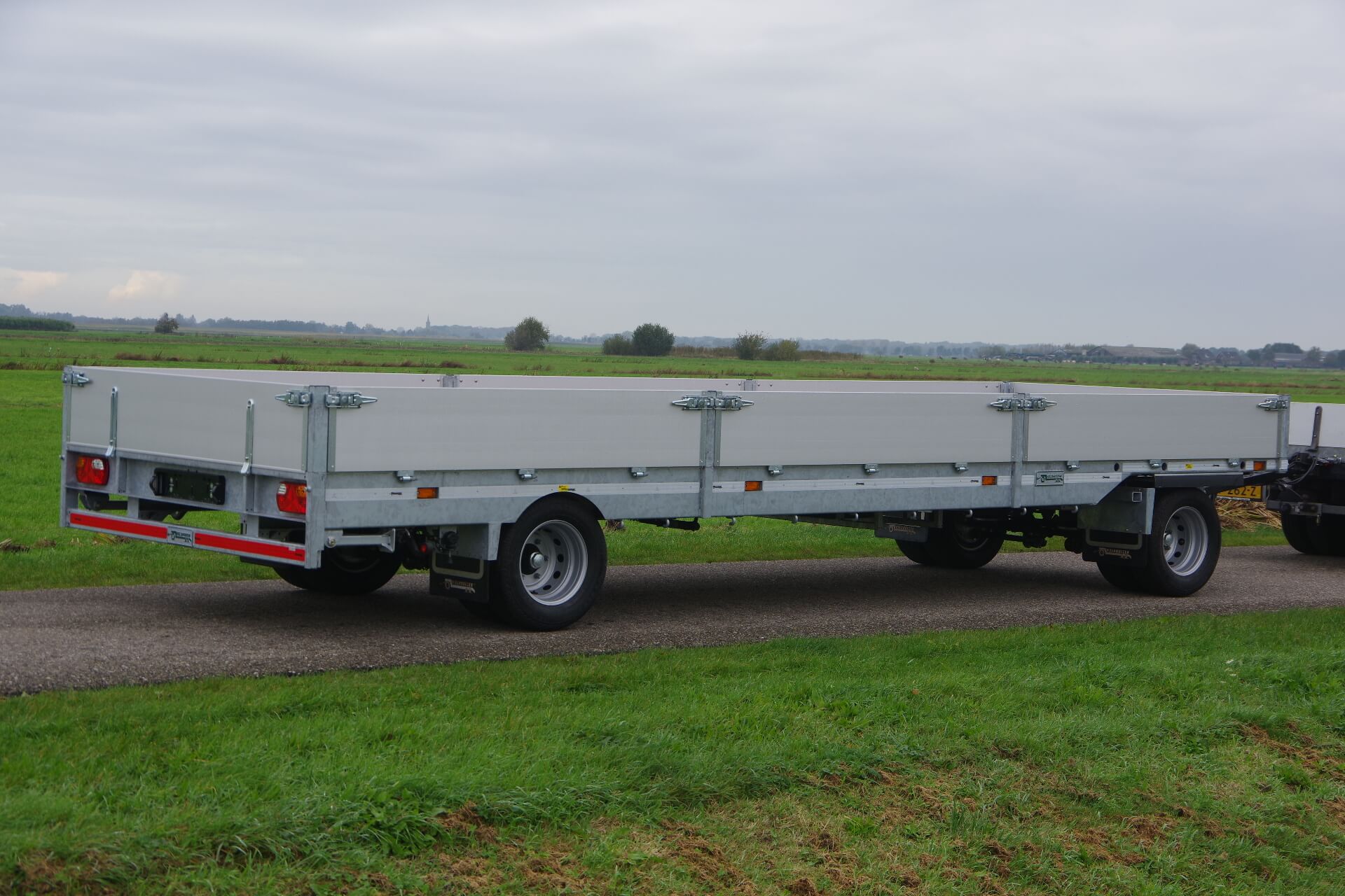10 T vlakke aanhanger7,3m met alu ra 2