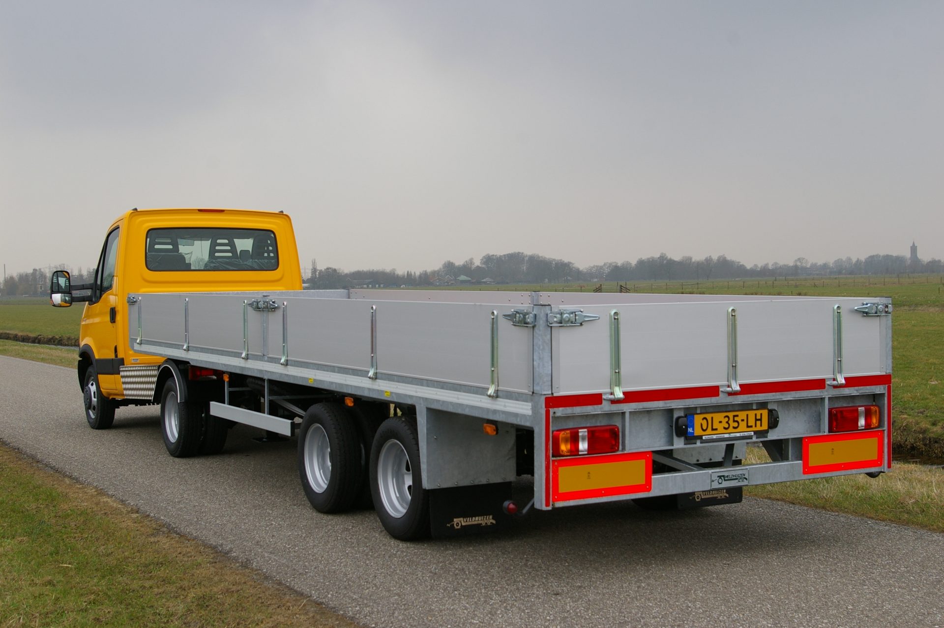 35C17 L met 7 mtr vlakke oplegger la