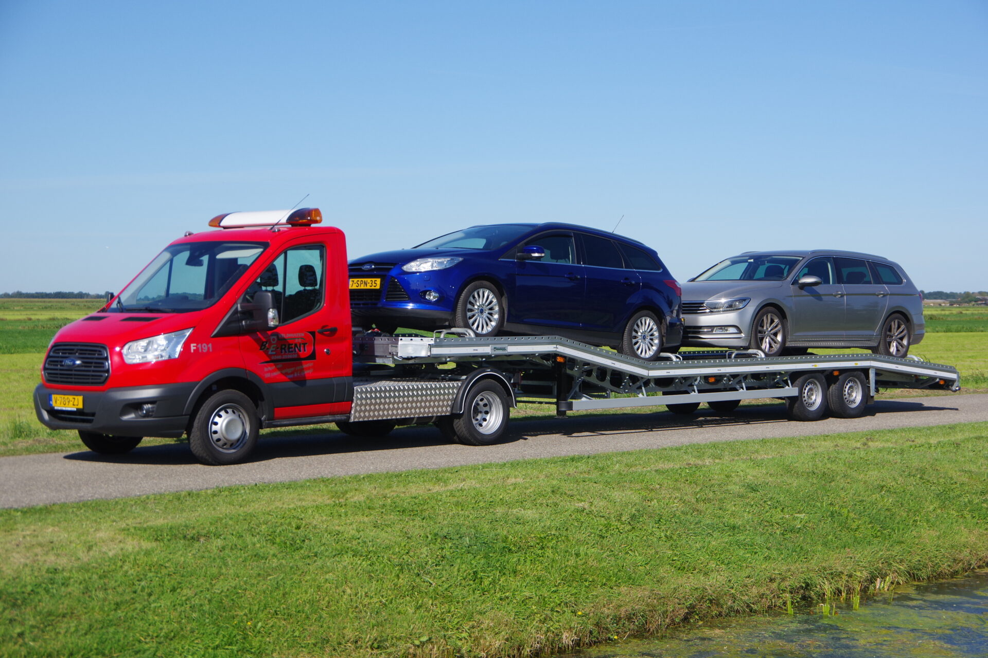 Transit met Auto oplegger Light beladen lv 4