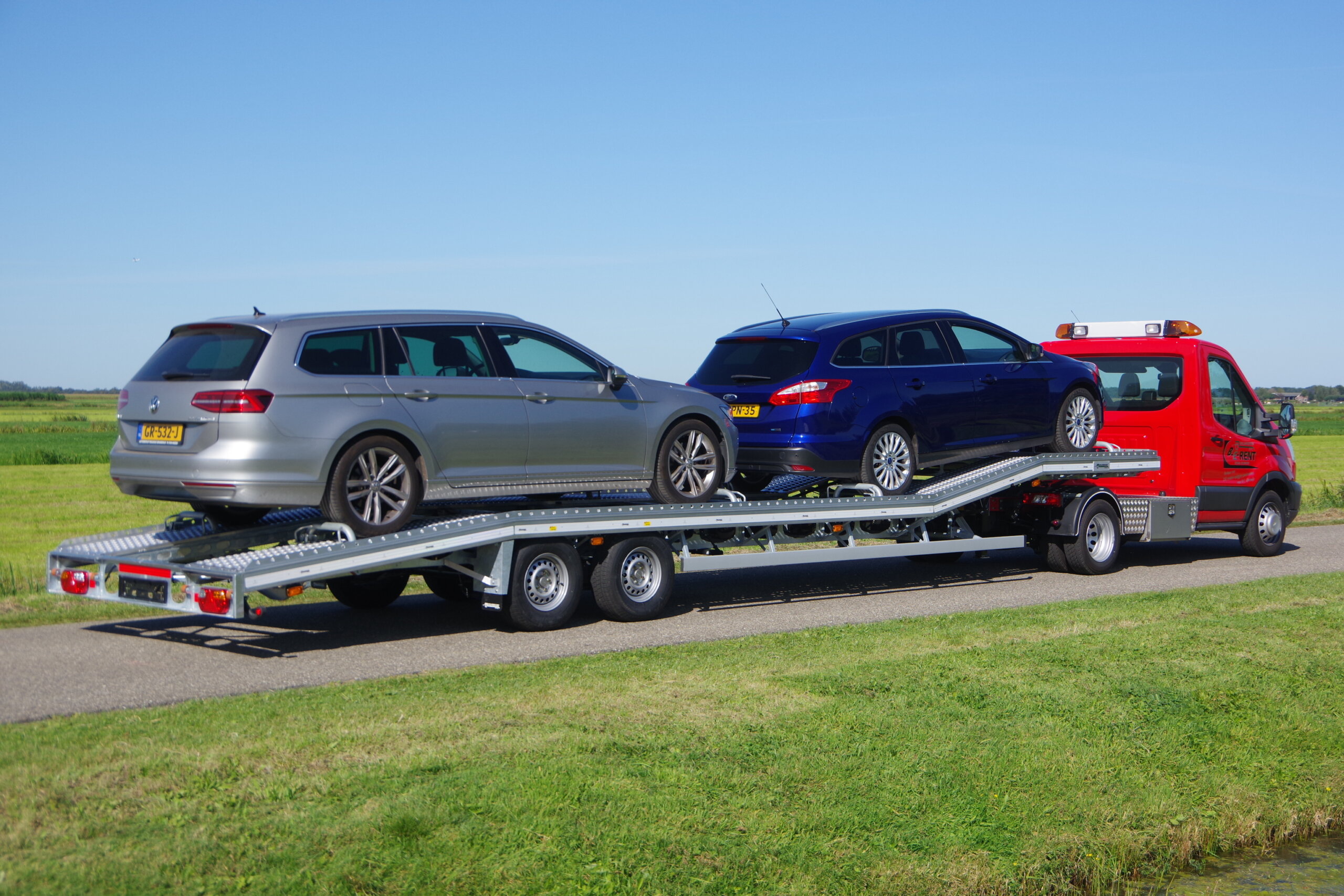 Transit met Auto oplegger Light beladen ra 1